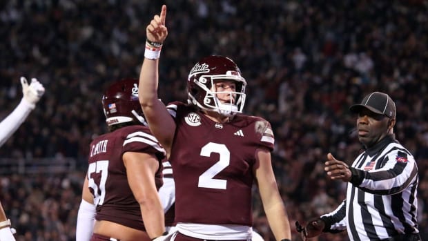 Nov 23, 2023; Starkville, Mississippi, USA; Mississippi State Bulldogs quarterback Will Rogers (2) reacts during the second half against the Mississippi Rebels at Davis Wade Stadium at Scott Field. Mandatory Credit: Petre Thomas-USA TODAY Sports
